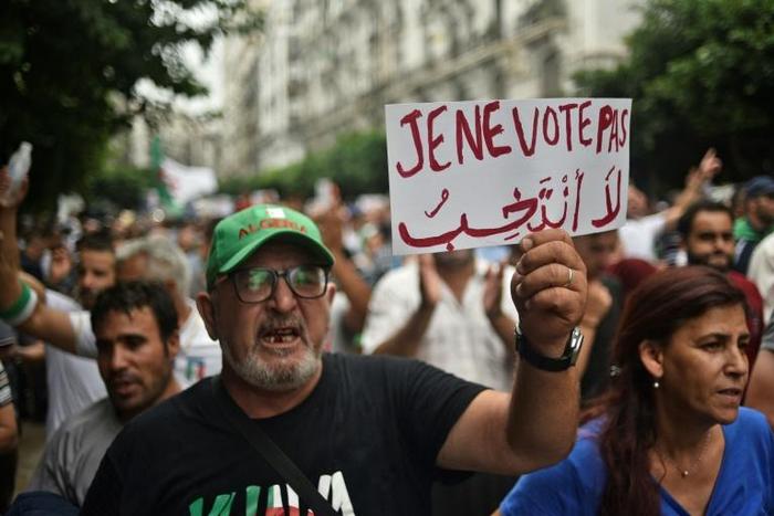 Algerians took to the streets for the 30th consecutive week on Friday, protesting proposed presidential elections