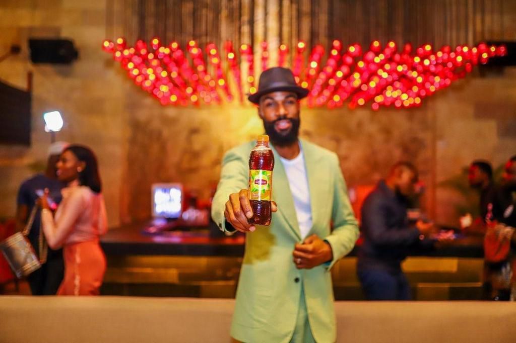 Lipton Ice Tea presents prize to BBNaija season 4 runner-up Mike