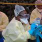 A girl receives a vaccine against Ebola from a nurse in Goma on August 7, 2019