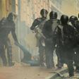 Riot police arrest a demonstrator during a protest following the announcement of a transport strike against Ecuadorean President Lenin Moreno's government economic policies