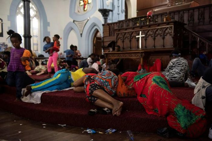 More than 200 foreigners have been occupying the church after being removed from a UN office