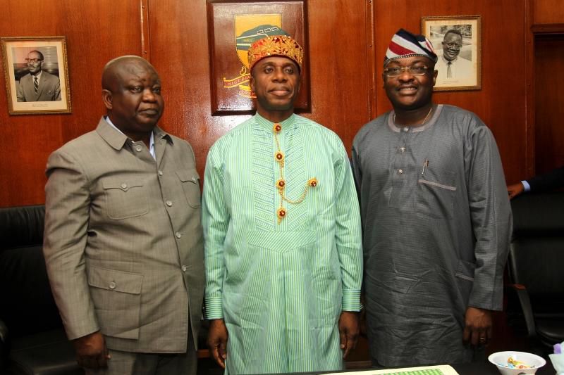 Mr Fidet Okhiria, Managing Director, Nigerian Railway Corporation (NRC)  and Minister of Transportation, Rotimi Amaechi [Chronicle]