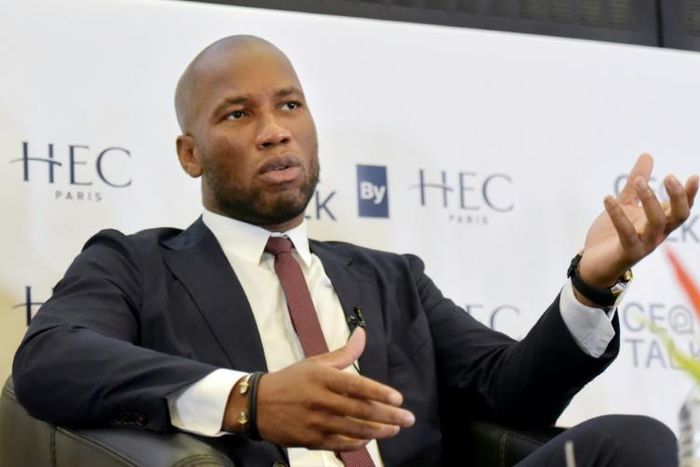 Drogba, pictured here at an event in Paris in September, is a national hero in Ivory Coast