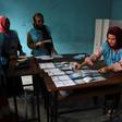 Afghan Independent Election Commission (IEC) officials count ballot papers after polling station closed in Mazar-i- Sharif