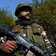 A soldier stands guard near Raj Bhavan, the official governor's residence, ahead of the swearing-in ceremony of first lieutenant governor of Jammu and Kashmir union territory, in Srinagar