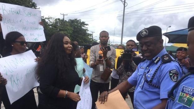 Women protested at Police headquarters in Port Harcourt over serial killings of women in hotels in the state. (BBC)