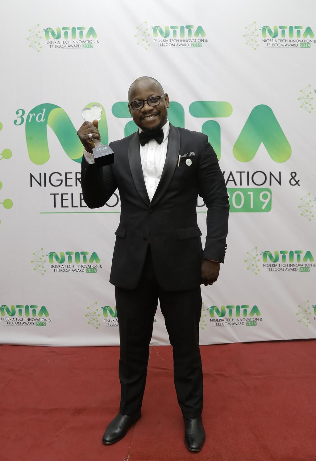 Marketing Manager, Spectranet Limited, Samson Akejelu (right) receiving the Internet Service Provider of the Year (Consumer) scooped by Spectranet 4G LTE from President, Association of Telecommunications Companies of Nigeria (ATCON), Olusola Teniola at...