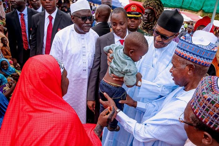 President Muhammadu Buhari meets with IDPs in Katsina, assures of improved security [Twitter/@BashirAhmaad]