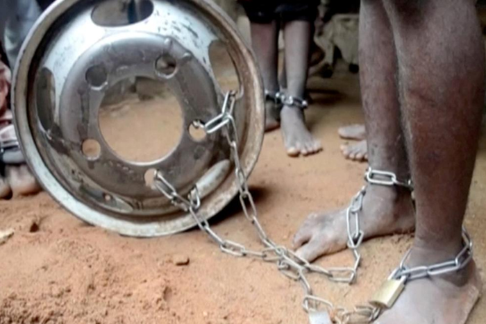 People with chained legs are pictured after being rescued from a building in the northern city of Kaduna, Nigeria September 26, 2019, in this grab obtained from a video. TELEVISION CONTINENTAL/Reuters TV via REUTERS