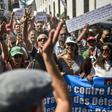 Protesters called for the resignation of the army chief and other political figures in Algeria on Friday, as demonstrations moved into a seventh month