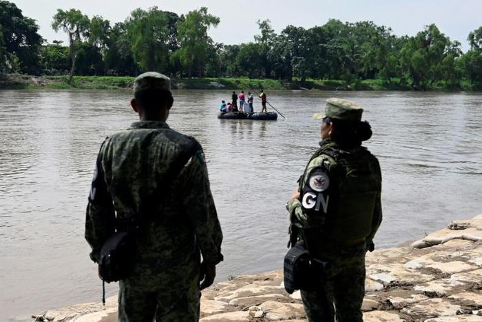 Mexican National Guard members (pictured July 2019) stand guard along the banks of the Suchiate river in Ciudad Hidalgo, Chiapas State, to prevent illegal crossings Guatemala