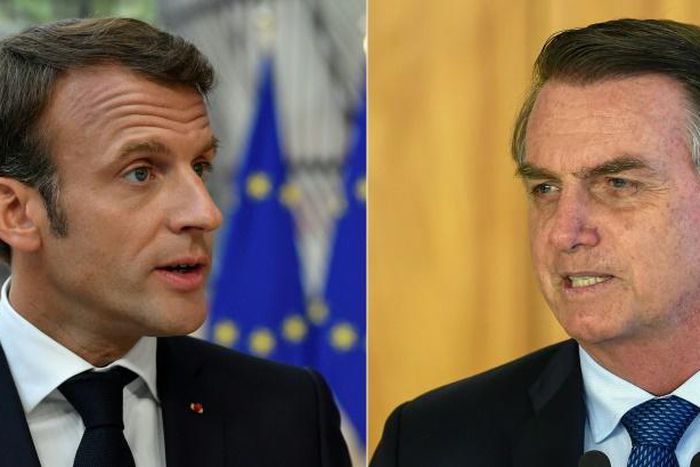 France's President Emmanuel Macron (left) has accused Brazilian President Jair Bolsonaro of lying to him about Brazil's climate change stance