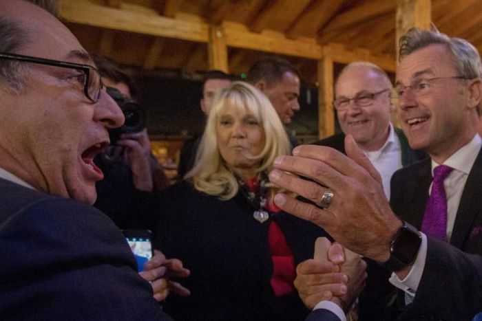 Former head of the the far-right Freedom Party Austria (FPOe) Heinz-Christian Strache (Left) greets new party leader Norbert Hofer (Right) during the FPOe Oktoberfest in Vienna ahead of snap polls on Sunday