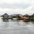 The 'island' floats on a platform made from hundreds of thousands of discarded plastic bottles