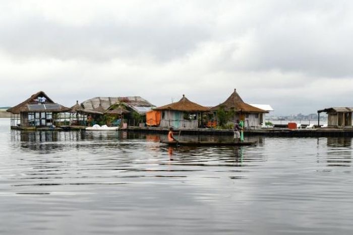 The 'island' floats on a platform made from hundreds of thousands of discarded plastic bottles