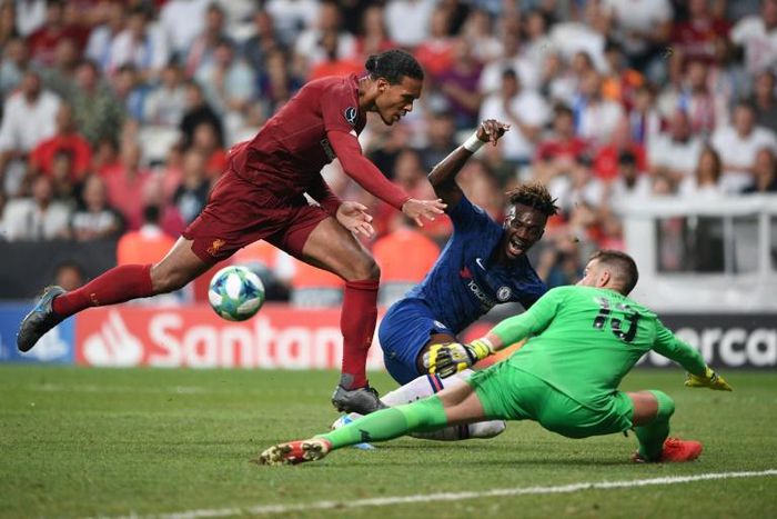 Liverpool goalkeeper Adrian (right) was injured by a celebrating supporter after Wednesday's UEFA Super Cup win over Chelsea