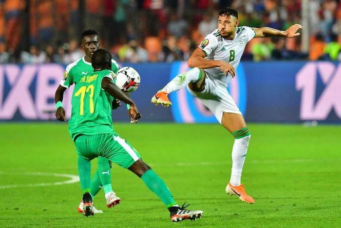 Algeria winger Youcef Belaili (R) playing against Senegal during the 2019 Africa Cup of Nations final in Cairo. He scored direct from a corner to give the Desert Foxes a 2021 qualifying victory in Botswana this week