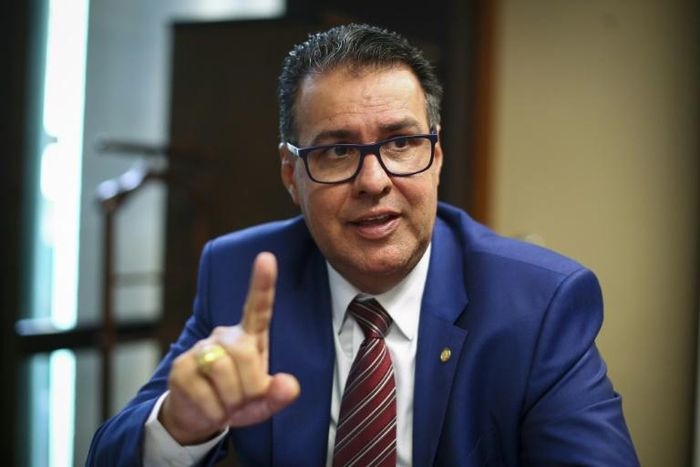 Brazilian lawmaker Jose Augusto Rosa, known as Captain Augusto, wants Brazilians to have easier access to guns to defend themselves in a "civil war" against criminals