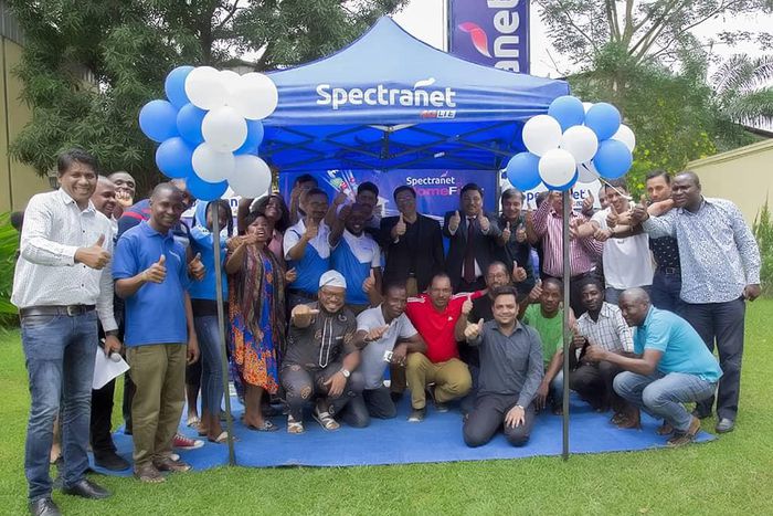 Staffers and management team of Spectranet 4G LTE pose for photographs at the event.