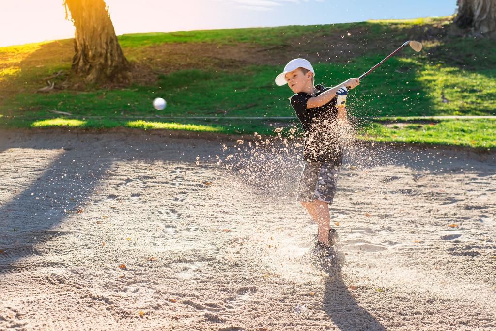 Actor Michael Pea Golfs with His 10-Year-Old Son