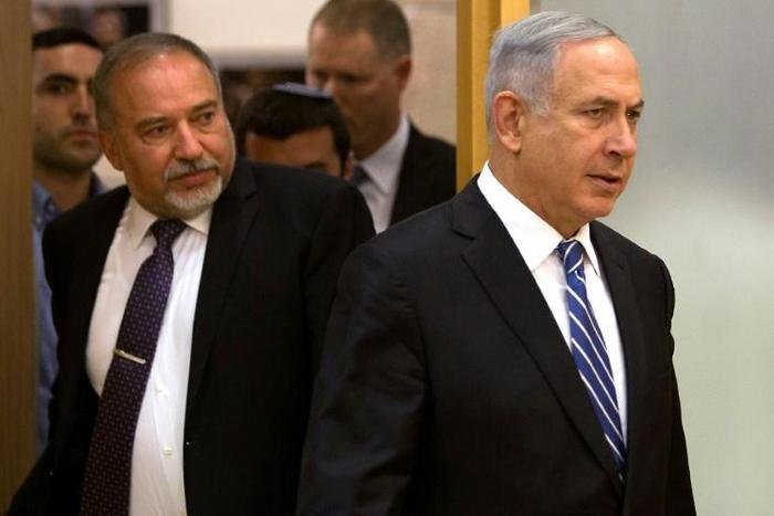 Former defence minister Avigdor Lieberman (L) has gained in popularity since April's election which saw Netanyahu (R) fail to put together a coalition