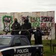 In a file photo from 2018, Mexican police in Michoacan state, where 14 officers were killed in an ambush on October 14, 2019