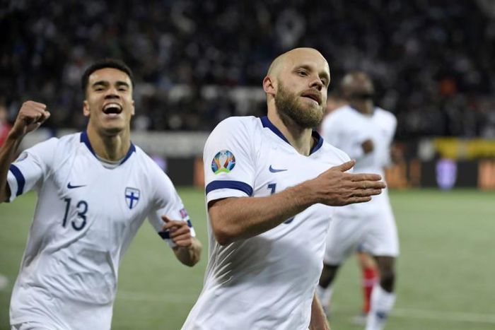 Teemu Pukki celebrates one of his two goals as Finland reached a major European finals for the first time