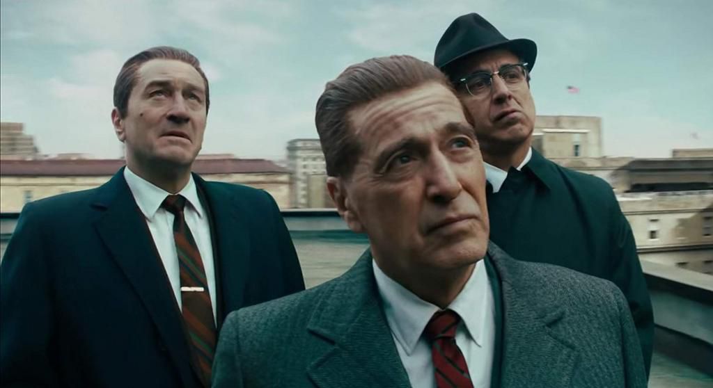 From left to right: Frank Sheeran (Robert De Niro), Jimmy Hoffa (Al Pacino), and Ray Romano (Bill Bufalino)