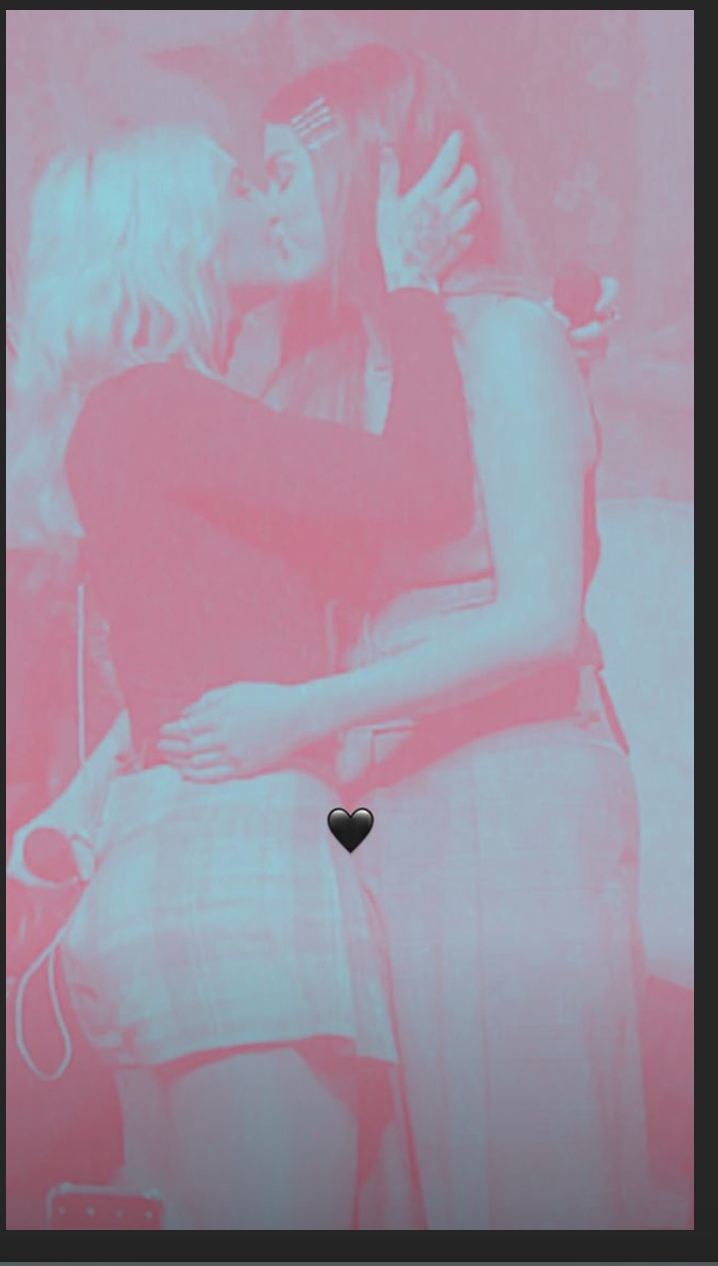 Selena Gomez and Julia Michaels kissing.