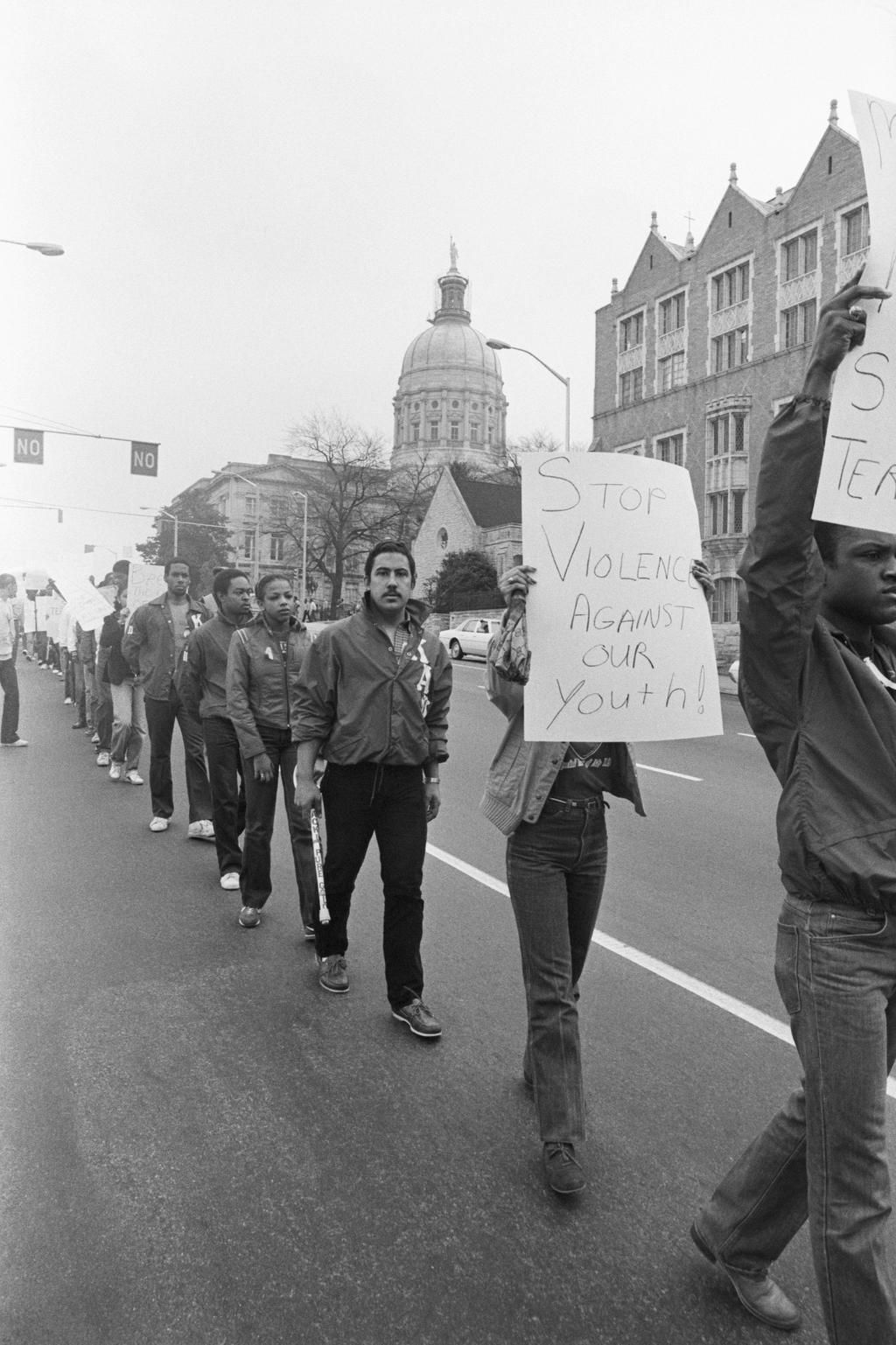 Protestors swarm the streets of a terrorized Atlanta in March 1981.