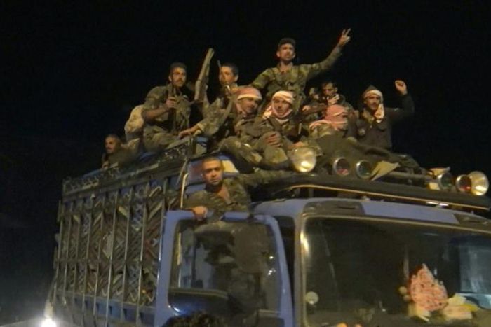 Syrian regime troops arrive in the northern border town of Kobane
