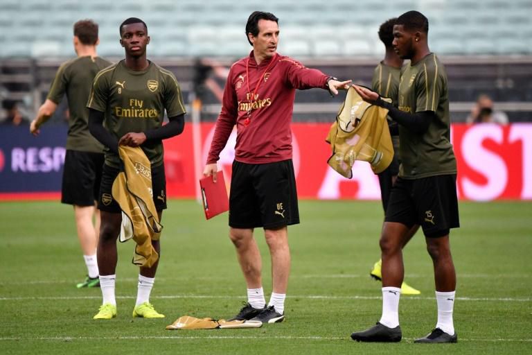 Unai Emery (C) leads his players in training in Baku on Tuesday. Arsenal have to beat Chelsea in the Europa League final if they are to return to the Champions League next season