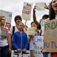 Swedish climate activist Greta Thunberg (C), 16, has inspired a worldwide youth movement demanding governments take action on climate change