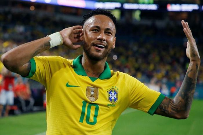 Brazil foward Neymar celebrates after scoring the equalizer in a 2-2 friendly draw against Colombia in Miami
