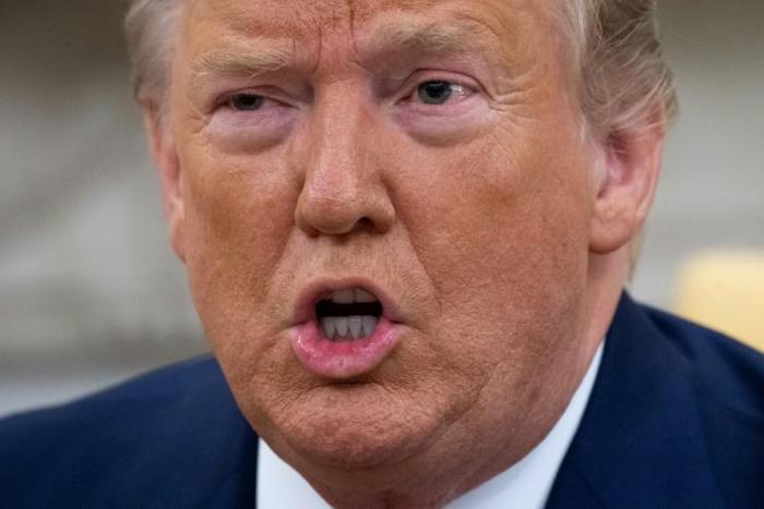 US President Donald Trump tells reporters in the Oval Office that he has imposed new sanctions on Iran's central bank