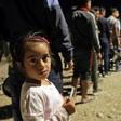 Aid groups say the number of Syrian Kurds seeking refuge in neighbouring Iraq could climb as high as 50,000