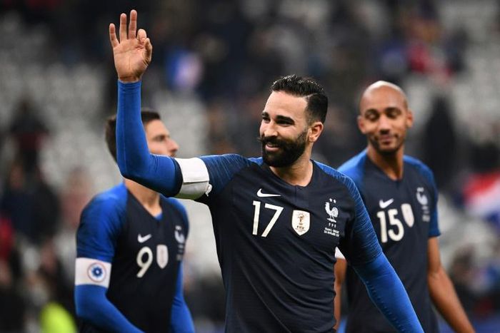 Marseille defender Adil Rami, shown playing for France, has been sacked by the club, reportedly for 'gross misconduct'