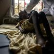 A doctor evaluates a patient at the combined medicine and sickle-cell anaemia center on February 3, 2016 at Kinshasa