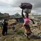 Residents of the Boribana neighbourhood in Abidjan salvage belongings as demolition of the district gets underway