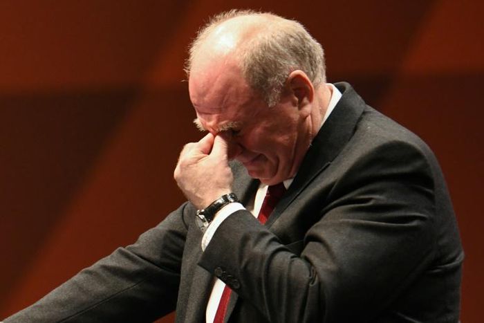 Outgoing Bayern Munich president Uli Hoeness fights back tears as he speaks at the club's annual general meeting on Friday