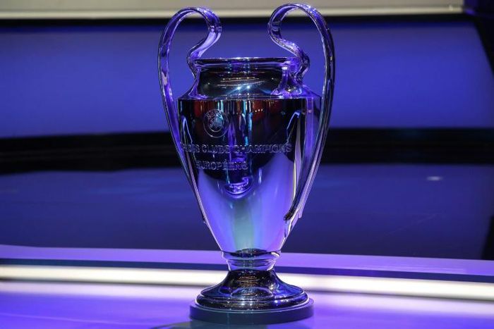The Champions League trophy stands on display during the group stage draw ceremony