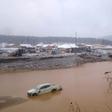 Investigators said they opened a criminal probe into the violation of safety rules after the collapse of a dam in Siberia