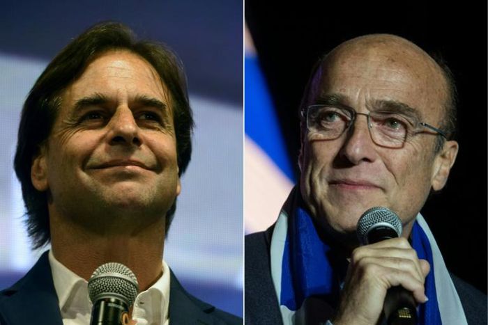 Luis Lacalle Pou (L) of the Partido Nacional party became Uruguay's next president after Daniel Martinez with the ruling Frente Amplio (Broad Front) party conceded