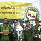 Former senior commander Ivan Marquez (center) and fugitive rebel colleague Jesus Santrich (in sunglasses), of the dissolved FARC rebel army group in Colombia, announced that they are taking up arms again along with other guerrillas