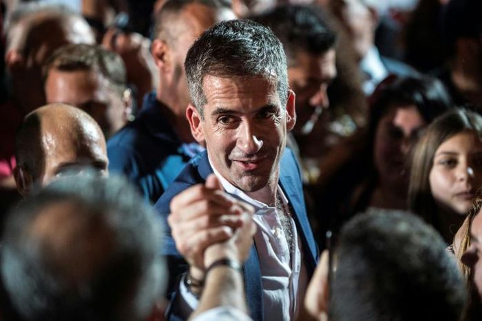 Kostas Bakoyannis chose to take his oath of office in the run-down district of Akadimia Platonos