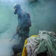 A member of the Cuban army fumigates against the Aedes aegypti mosquito to prevent the spread of Zika, chikungunya and dengue, in Havana, on February 23, 2016