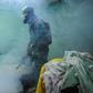 A member of the Cuban army fumigates against the Aedes aegypti mosquito to prevent the spread of Zika, chikungunya and dengue, in Havana, on February 23, 2016