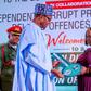 President Muhammadu Buhari honours Mrs Josephine Ugwu, a former cleaner at the Murtala Muhammed International Airport (MMIA), Lagos, who found and returned millions of naira forgotten in the toilet by airport users.[Twitter/@BashirAhmaad]