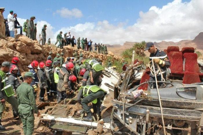 Moroccan rescuers search for bodies after floods overturned a bus on September 8 in the kingdom's southeast