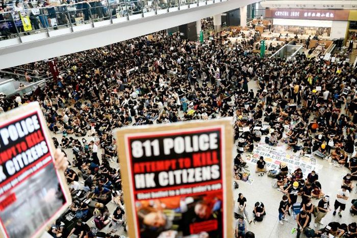 Thousands of pro-democracy protesters rallied in Hong Kong airport, where flights were cancelled